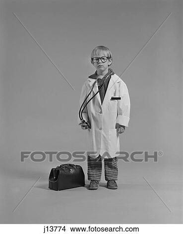 1970S Boy Dressed As Medical Doctor View Large Photo Image Picture - 1970S Boy Dressed As Medical Doctor. Fotosearch