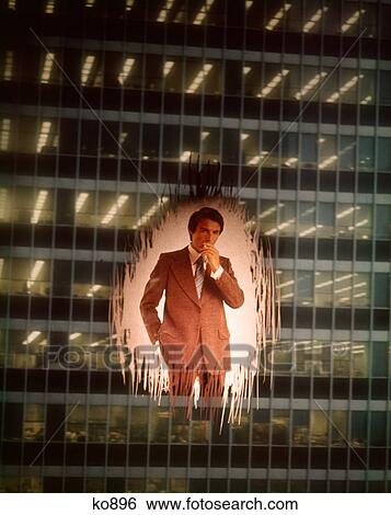 1970S Businessman Smoking Cigarette Superimposed On Exterior Office Building Window View Large Photo Image Stock Photograph - 1970S Businessman Smoking Cigarette Superimposed On Exterior Office Building Window . Fotosearch