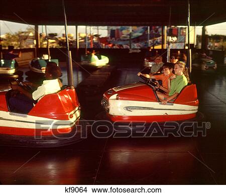 1970S Children Boys Girls Riding Bumper Cars Ride At Amusement Park View Large Photo Image Picture - 1970S Children Boys Girls Riding Bumper Cars Ride At Amusement Park . Fotosearch