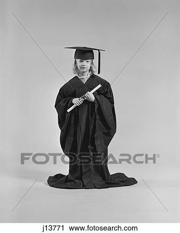 1970S Girl Wearing Graduation Cap Gown Holding Diploma View Large Photo Image Stock Image - 1970S Girl Wearing Graduation Cap Gown Holding Diploma. Fotosearch
