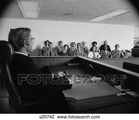 Stock Image - 1970S Judge Addressing Jury In Courtroom. Fotosearch