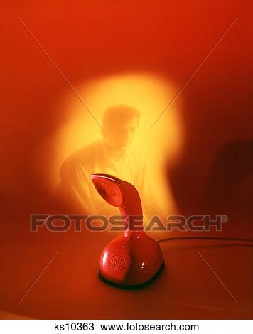 1970S Modern Designer Red Telephone Worried Mystery Man Yellow In Background View Large Photo Image Stock Image - 1970S Modern Designer Red Telephone Worried Mystery Man Yellow In Background. Fotosearch