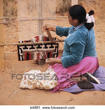 1970S Navajo Woman Sitting Weaving A Rug With A Traditional Navajo Pattern View Large Photo Image Stock Image - 1970S Navajo Woman Sitting Weaving A Rug With A Traditional Navajo Pattern. Fotosearch