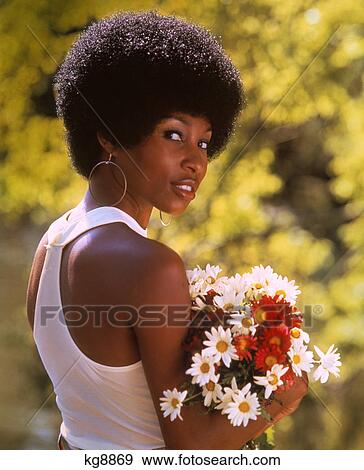 1970S Smiling African American Woman Wearing Hoop Earrings White Tank