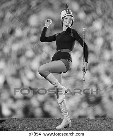 1970S Smiling Young Woman Majorette White Boots Hot Pants Marching View Large Photo Image Picture - 1970S Smiling Young Woman Majorette White Boots Hot Pants Marching. Fotosearch