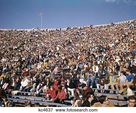 1970S Stadium Crowd Young Teen Faces At University Of Michigan Stadium Ann Arbor Event View Large Photo Image Stock Photo - 1970S Stadium Crowd Young Teen Faces At University Of Michigan Stadium Ann Arbor Event . Fotosearch