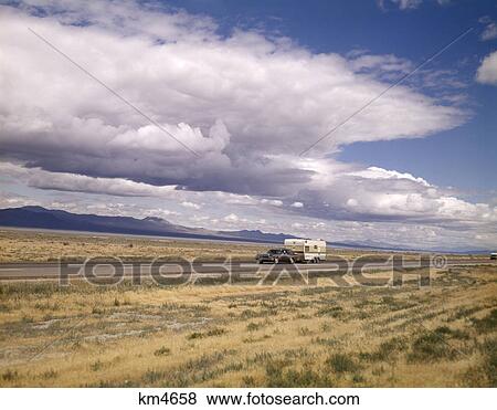 1970S Station Wagon Pulling Rv Camper Interstate 80 Near Winnemucca Nevada View Large Photo Image Stock Photo - 1970S Station Wagon Pulling Rv Camper Interstate 80 Near Winnemucca Nevada. Fotosearch