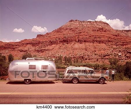 1970S Station Wagon Trailer Rv New Mexico Highway Tourist Man Woman By Mesa Formation Airstream View Large Photo Image Stock Image - 1970S Station Wagon Trailer Rv New Mexico Highway Tourist Man Woman By Mesa Formation Airstream . Fotosearch