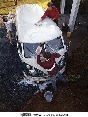 1970S Two Teenage Boys And Girl Washing A Volkswagen Van Automobile View Large Photo Image Stock Photo - 1970S Two Teenage Boys And Girl Washing A Volkswagen Van Automobile. Fotosearch