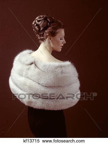 1970S Woman From Back Wear Light Color Fur Stole Around Her Shoulders View Large Photo Image Stock Photography - 1970S Woman From Back Wear Light Color Fur Stole Around Her Shoulders . Fotosearch