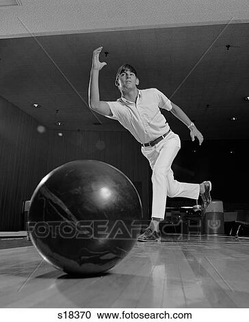 1970S Young Man Having Just Thrown A Bowling Ball View Large Photo Image Stock Image - 1970S Young Man Having Just Thrown A Bowling Ball. Fotosearch