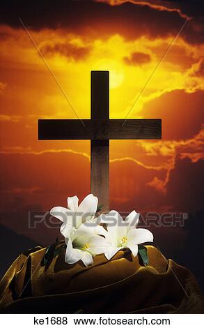 Stock Photo - 1980S Easter Lilies At Base Of Cross . Fotosearch