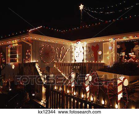 Picture - 1990S Elaborate Christmas Lighting And Decoration Around Ranch House Lakewood New Jersey Usa. Fotosearch
