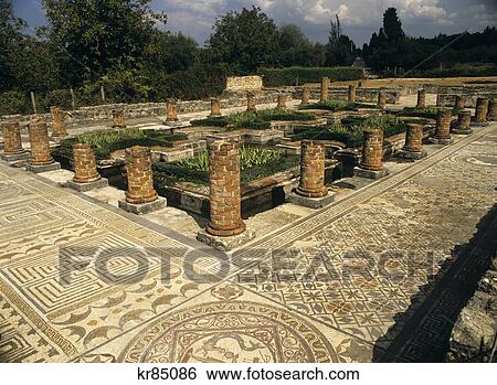 1990S Mosaics & View Of Triclinium In 3Rd Century House Of Fountains At The Roman Town Ruins Of Conimbriga Portugal View Large Photo Image Stock Photograph - 1990S Mosaics & View Of Triclinium In 3Rd Century House Of Fountains At The Roman Town Ruins Of Conimbriga Portugal . Fotosearch