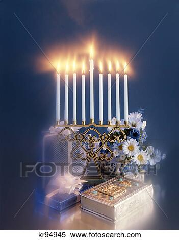 1990S Nine-Branched Menorah Candelabrum Lit During The Eight-Day Holiday Of Hanukkah Flowers Gifts And Silver Cased Torah View Large Photo Image Stock Photography - 1990S Nine-Branched Menorah Candelabrum Lit During The Eight-Day Holiday Of Hanukkah Flowers Gifts And Silver Cased Torah . Fotosearch