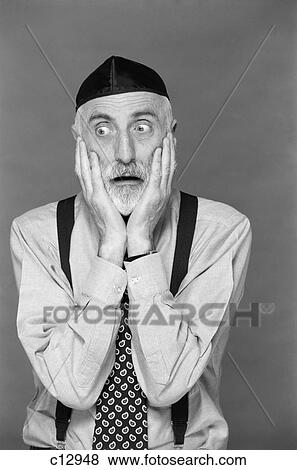 1990S Portrait Jewish Man Gray Beard Wearing Yarmulke Both Hands On Face Funny Expression Oy Vey Shock Fear Worry Despair View Large Photo Image Stock Photo - 1990S Portrait Jewish Man Gray Beard Wearing Yarmulke Both Hands On Face Funny Expression Oy Vey Shock Fear Worry Despair. Fotosearch