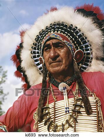 1990S Portrait Of Native American Sioux Indian Chief Wearing Feather Bonnet Headdress And Pipe Stem Chest Plate View Large Photo Image Stock Image - 1990S Portrait Of Native American Sioux Indian Chief Wearing Feather Bonnet Headdress And Pipe Stem Chest Plate. Fotosearch