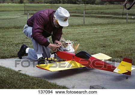 1990S Senior Man Model Airplane Hobbyist View Large Photo Image Picture - 1990S Senior Man Model Airplane Hobbyist . Fotosearch