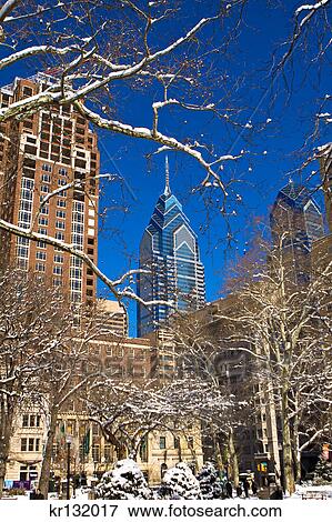Stock Photo - 2000S 2009 Liberty Place Skyscapers From Snowy Winter Rittenhouse Square Park Philadelphia Pennsylvania. Fotosearch