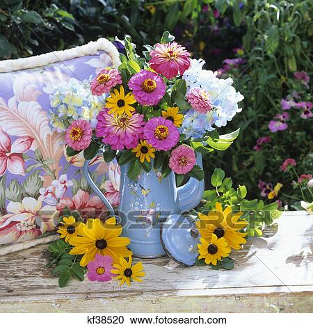 2000S Bouquet Of Black Eyed Susans And Pink Flowers In Pitcher On Garden Bench View Large Photo Image Stock Image - 2000S Bouquet Of Black Eyed Susans And Pink Flowers In Pitcher On Garden Bench. Fotosearch