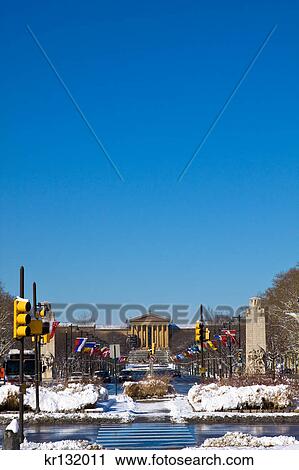 Stock Image - 2000S Philadelphia Museum Of Art From Snowy Benjamin Franklin Parkway Philadelphia Blue Cloudless Sky. Fotosearch