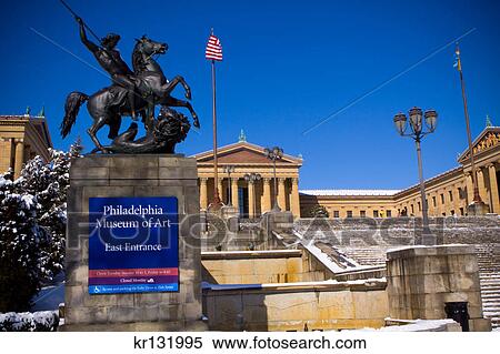 Stock Photography - 2000S Statue Of The Lion Fighter At East Entrance Philadelphia Museum Of Art In Winter Snow. Fotosearch