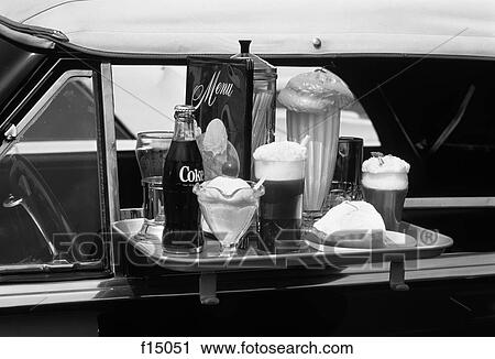 Food Tray With Soda Fountain Items On Car Window At 1950S Style Drive-In Restaurant View Large Photo Image Stock Image - Food Tray With Soda Fountain Items On Car Window At 1950S Style Drive-In Restaurant . Fotosearch