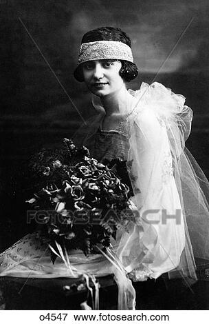 1920S Formal Portrait Of Bride With Bouquet Looking At Camera View Large Photo Image Stock Photo - 1920S Formal Portrait Of Bride With Bouquet Looking At Camera. Fotosearch