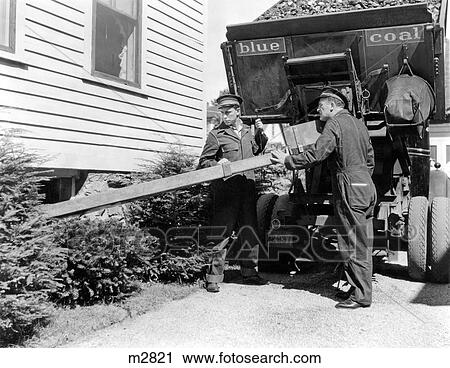 1930S 1940S Coal Truck With Two Service Men Making Home Delivery Coal Chute Into Basement View Large Photo Image Stock Image - 1930S 1940S Coal Truck With Two Service Men Making Home Delivery Coal Chute Into Basement . Fotosearch