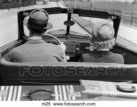 1930S 1940S Rear View Couple Driving Together In Convertible Luggage In Back Seat View Large Photo Image Stock Photography - 1930S 1940S Rear View Couple Driving Together In Convertible Luggage In Back Seat . Fotosearch