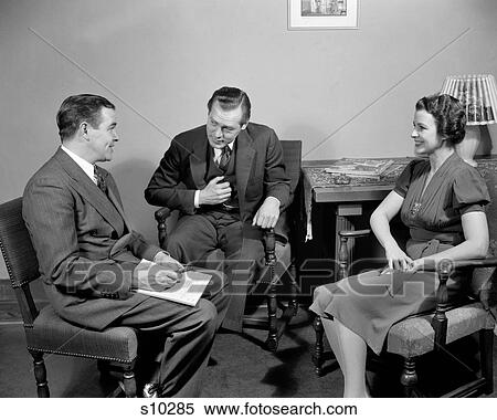 1930S 1940S Salesman Talking To Couple Man And Woman In Living Room Sales Presentation View Large Photo Image Stock Photography - 1930S 1940S Salesman Talking To Couple Man And Woman In Living Room Sales Presentation. Fotosearch