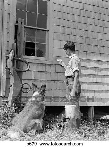 1930S Boy Painting Side Of Farm House With Collie Sitting Beside Him Watching View Large Photo Image Stock Photo - 1930S Boy Painting Side Of Farm House With Collie Sitting Beside Him Watching. Fotosearch