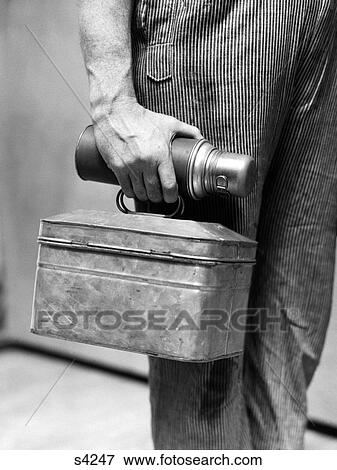 Stock Photo - 1930S Worker Man'S Hand Carrying Lunch Pail & Thermos Bottle. Fotosearch