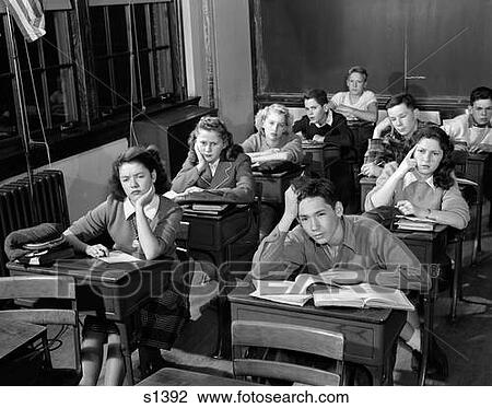 Stock Image - 1940S 1950S High School Classroom Of Bored Students Sitting At Desks. Fotosearch
