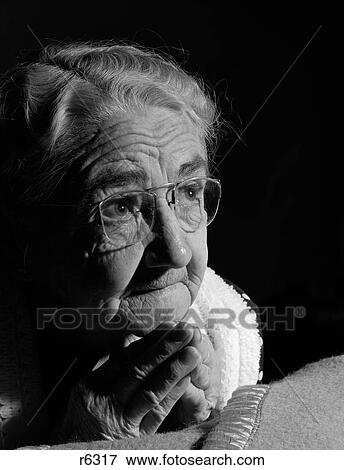 1950S 1960S Close-Up Of Elderly Woman Praying At Bedside Looking Upwards View Large Photo Image Stock Photo - 1950S 1960S Close-Up Of Elderly Woman Praying At Bedside Looking Upwards . Fotosearch