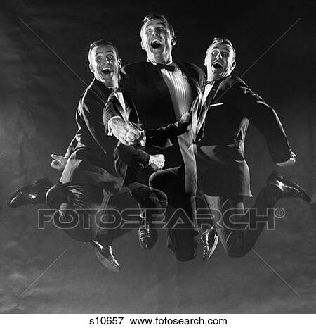 Stock Photo - 1950S 1960S Graphic Effect Triple Exposure Man In Dinner Jacket Jumping Up And Down. Fotosearch