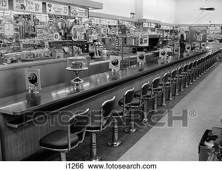 1950S 1960S Interior Of Lunch Counter With Chrome Stools View Large Photo Image Stock Photograph - 1950S 1960S Interior Of Lunch Counter With Chrome Stools. Fotosearch