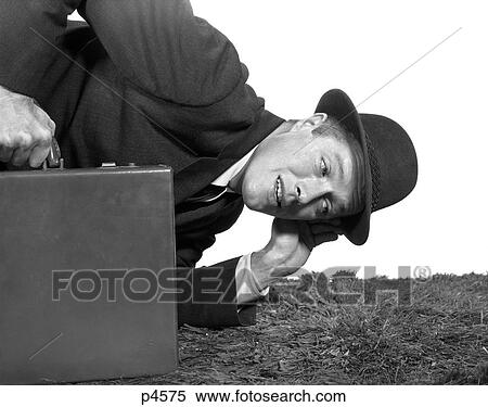 1950S Businessman With One Ear To The Ground Holding Briefcase View Large Photo Image Stock Photography - 1950S Businessman With One Ear To The Ground Holding Briefcase. Fotosearch