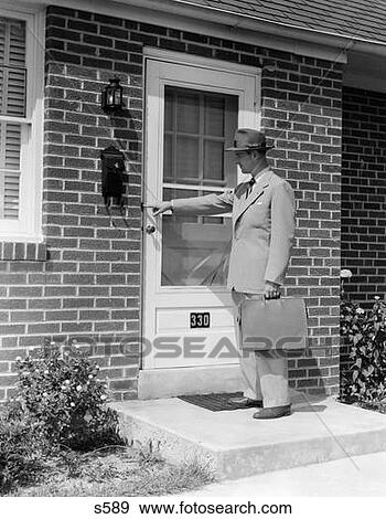 1950S Door-To-Door Salesman Man Ringing Doorbell At Suburban House Front Door Outdoor View Large Photo Image Stock Photo - 1950S Door-To-Door Salesman Man Ringing Doorbell At Suburban House Front Door Outdoor. Fotosearch