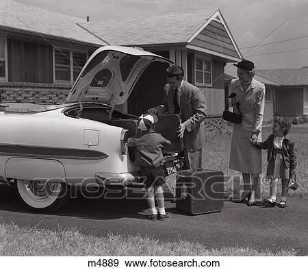 1950S Family Packing Trunk Of 1953 Chevrolet With Suitcases View Large Photo Image Stock Photo - 1950S Family Packing Trunk Of 1953 Chevrolet With Suitcases. Fotosearch