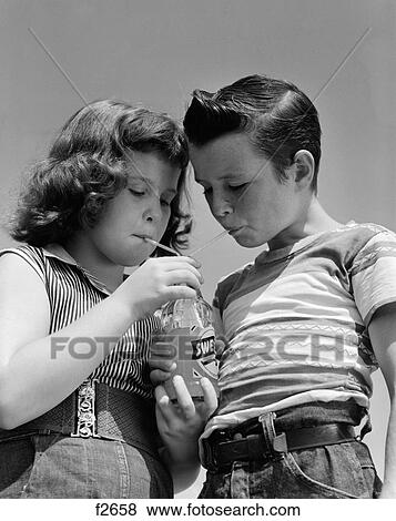 Stock Photo - 1950S Girl And Boy Share Soda Two Straws Summer Outdoor. Fotosearch