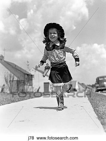 1950S Girl In Cowgirl Outfit Running On Sidewalk Towards Camera View Large Photo Image Stock Photo - 1950S Girl In Cowgirl Outfit Running On Sidewalk Towards Camera. Fotosearch