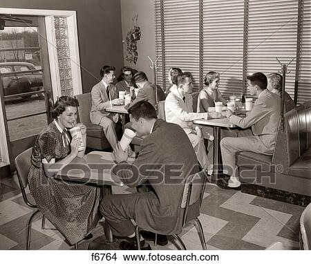 Picture - 1950S Malt Shop Interior With Teens At Booths Drinking From Dixie Cups. Fotosearch