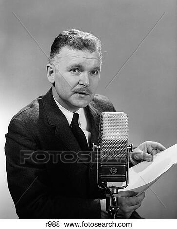 1950S Man Reading At Microphone Radio Broadcast Indoor Looking At Camera View Large Photo Image Stock Photo - 1950S Man Reading At Microphone Radio Broadcast Indoor Looking At Camera. Fotosearch