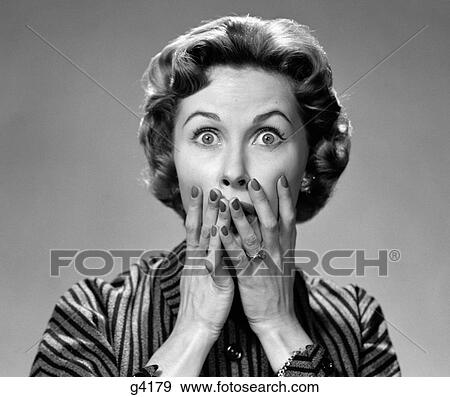 1950S Portrait Of Woman In Striped Dress Hands To Mouth With Shocked Expression Looking At Camera View Large Photo Image Stock Photo - 1950S Portrait Of Woman In Striped Dress Hands To Mouth With Shocked Expression Looking At Camera. Fotosearch
