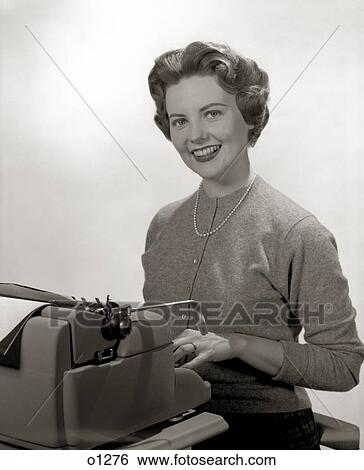 1950S Smiling Portrait Secretary Seated Behind Typewriter View Large Photo Image Stock Photograph - 1950S Smiling Portrait Secretary Seated Behind Typewriter. Fotosearch