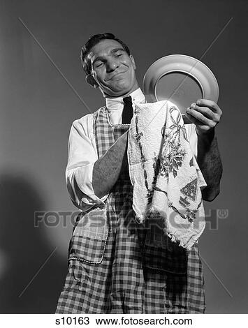 1960S 1950S Husband In Apron Drying Dishes View Large Photo Image Stock Image - 1960S 1950S Husband In Apron Drying Dishes. Fotosearch