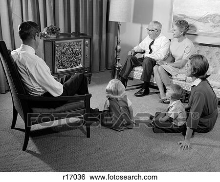 Stock Photograph - 1960S 3 Generation Family Watching Television. Fotosearch