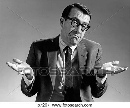 Stock Photo - 1960S Businessman Shrugging Shoulders Looking At Camera Hands Extended Palms Up . Fotosearch