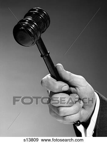 Stock Photo - 1960S Close Up Man'S Hand Using Gavel Indoor. Fotosearch